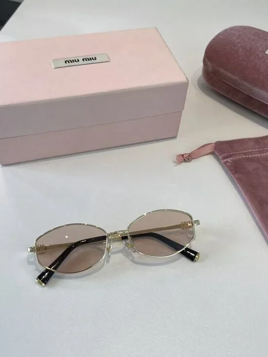 Miu Miu Cat-Eye Sunglasses with Gold Frames and Pink Lenses - Picture 5 of 7